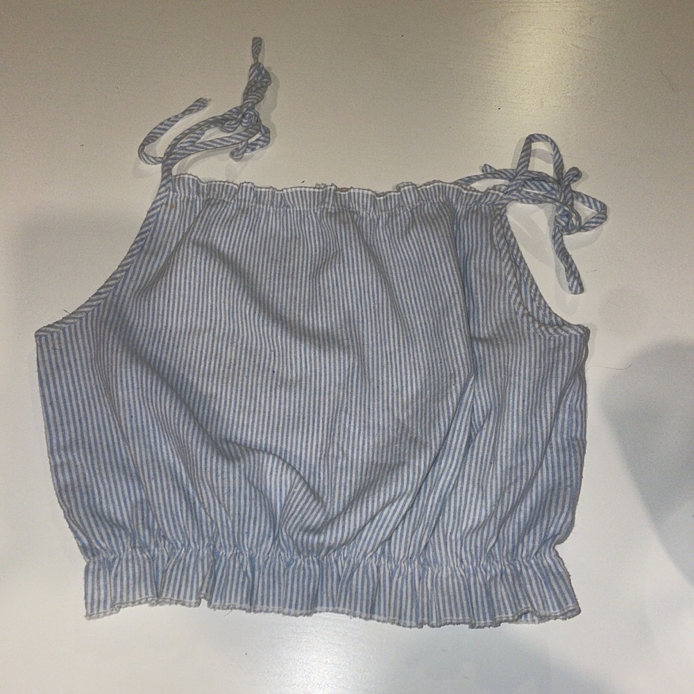 Cute little blue and white top with ties on shoulders